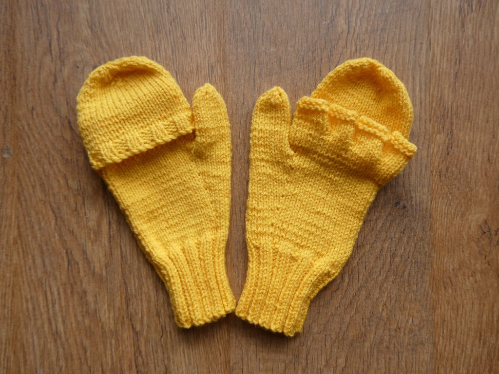 Knitted handmade yellow fingerless gloves that turn into mittens
