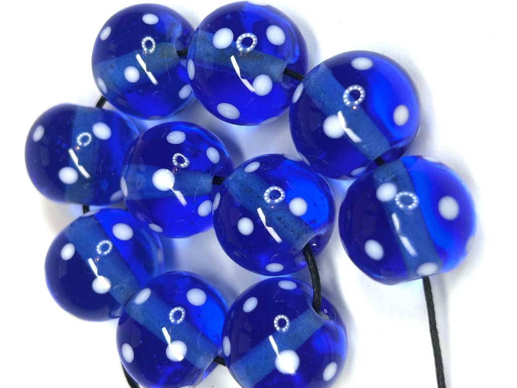 Handmade blue and white spotty patterned lamp work glass beads