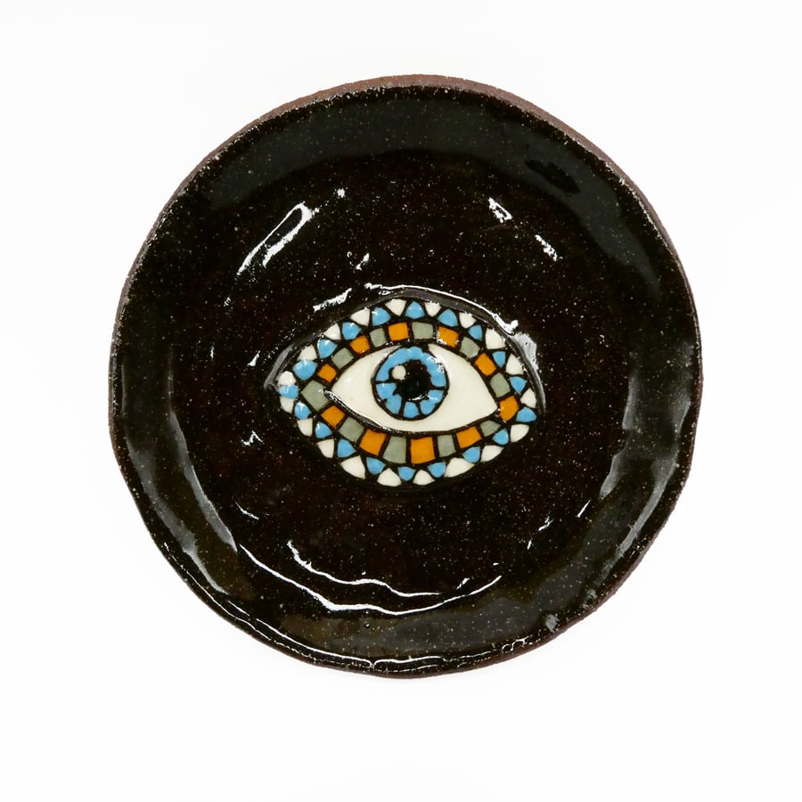 Small ceramic dish with eye