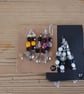 Set of colour coordinated beaded gift decorations. - Image 5