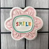 Large Smile pottery magnet pink