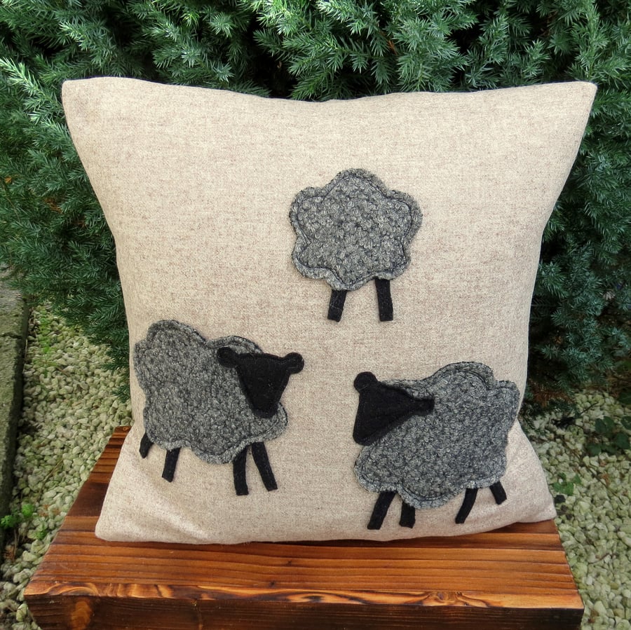 Black sheep.  A 37cmx 37cm sheep cushion, complete with feather pad.