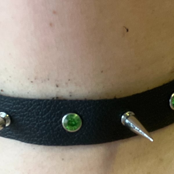 Black leather choker with 2 Spikes and 3 Green Gemstones