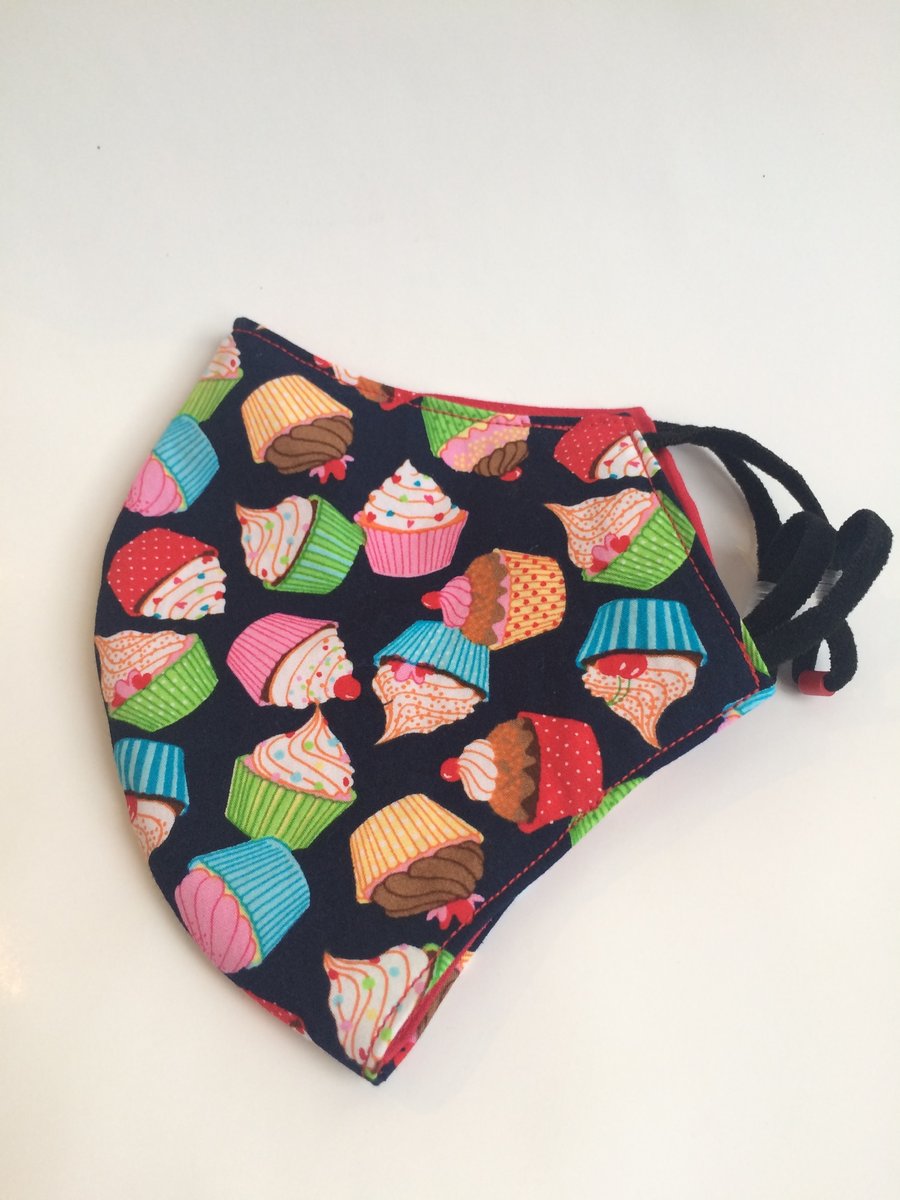 Medium size, reusable double layered, washable and adjustable cupcake face mask