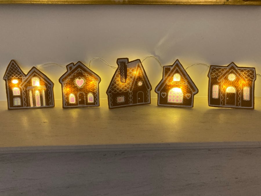 Gingerbread houses led light up Christmas garland. 