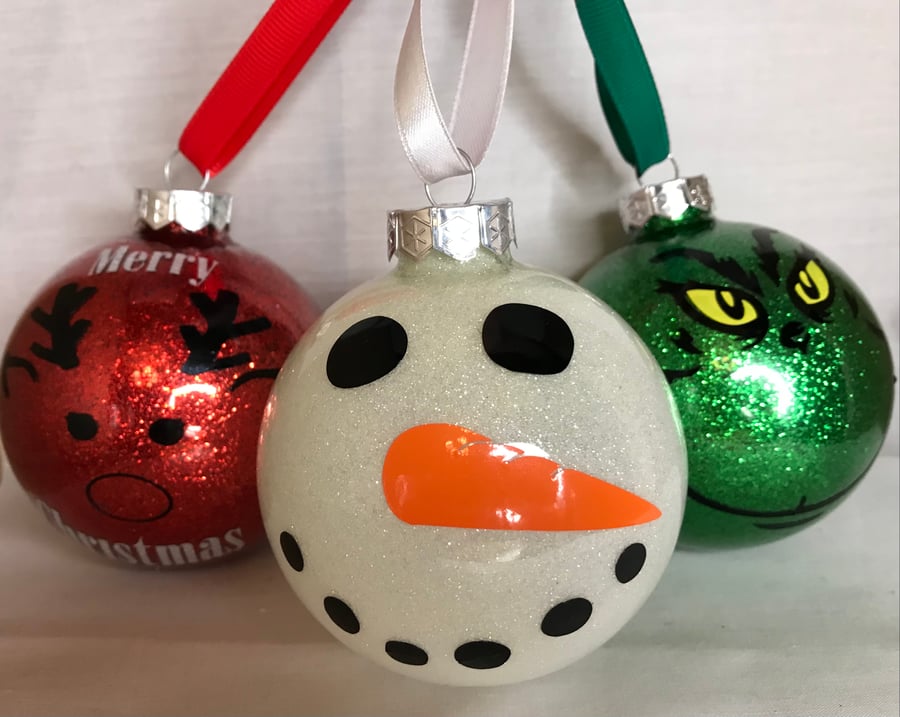 Three different glass glitter Christmas tree baubles 