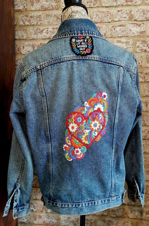`Hand embroidered denim jacket, with red heart floral design
