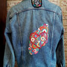 `Hand embroidered denim jacket, with red heart floral design
