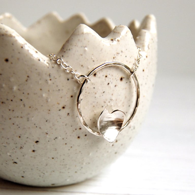 Silver heart and hammered circle necklace