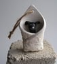 Black dog in a blanket - Image 1