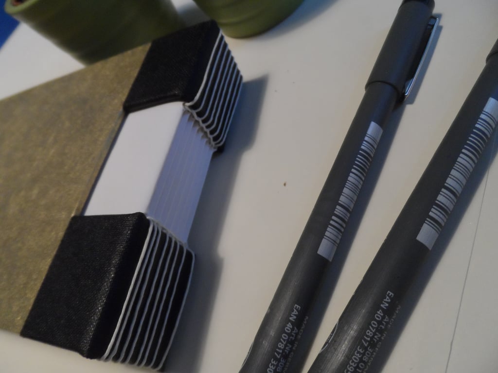 Hand stitched buttonhole book (no 1)