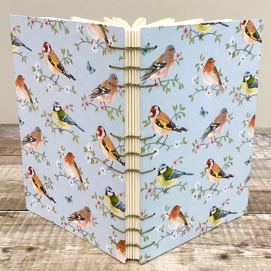 Journal Notebook Hand bound in Coptic Stitch with a Garden Birds Cover 