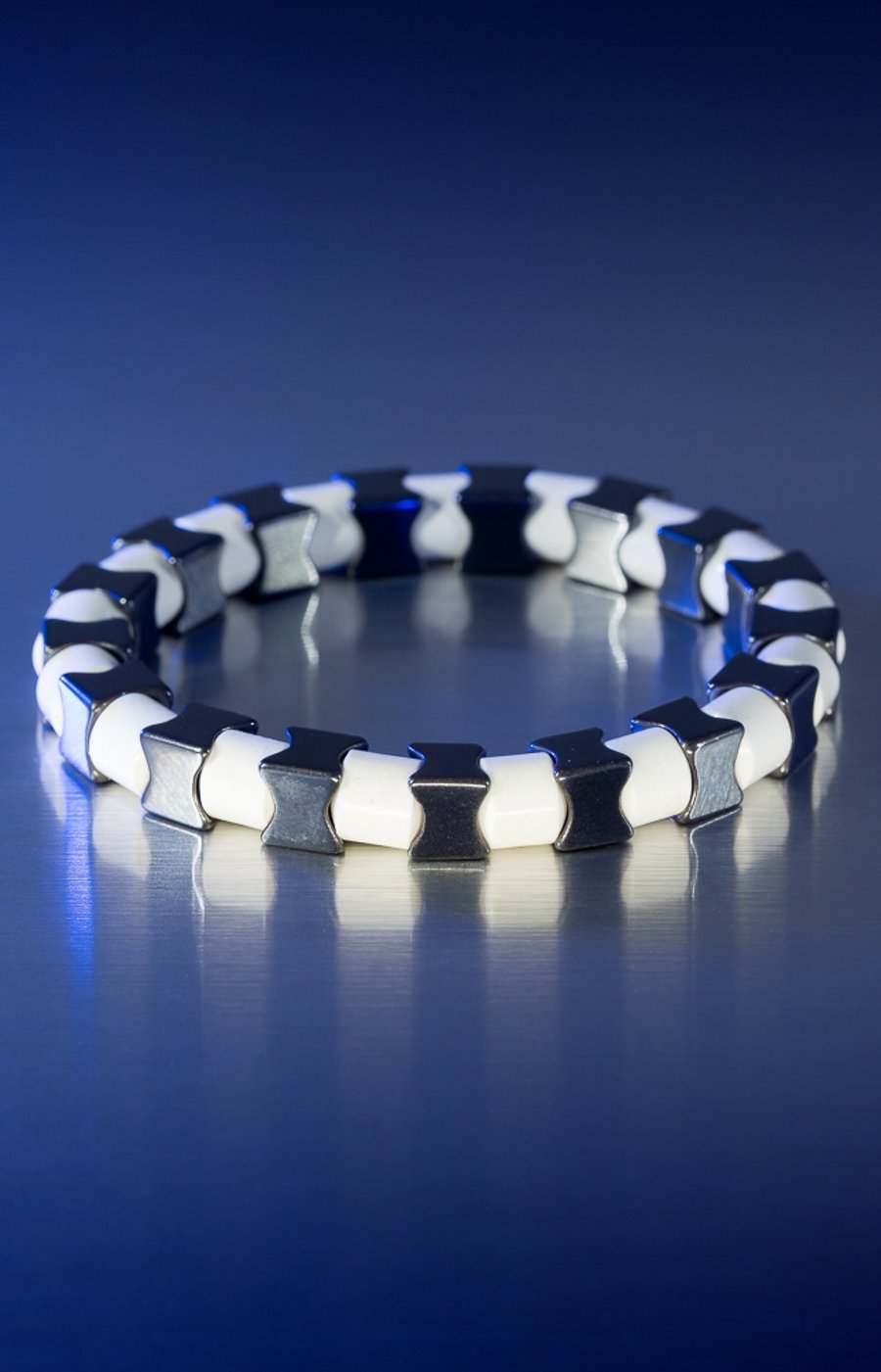 custom order for Lee-Chunky polished hematite & white ceramic bracelet