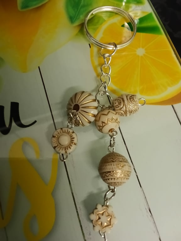 Pretty beaded 3 strand keyring, silver , nicely detailed beads. 