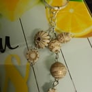 Pretty beaded 3 strand keyring, silver , nicely detailed beads. 