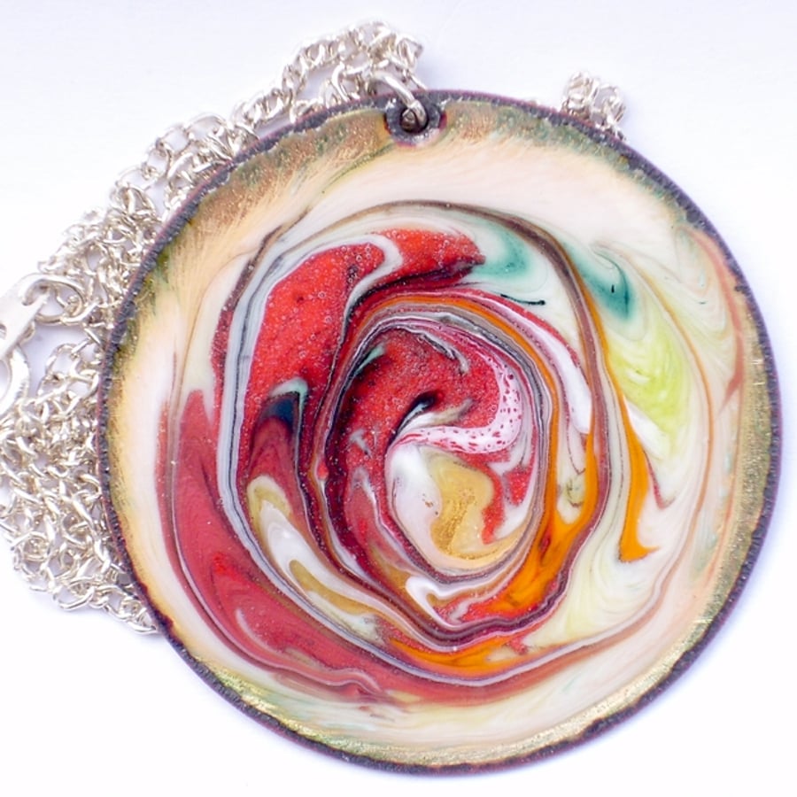 large round scrolled pendant