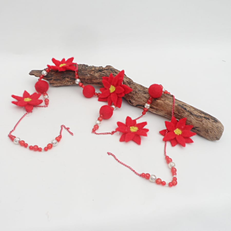 Red felted ball, bead and poinsettia Christmas garland