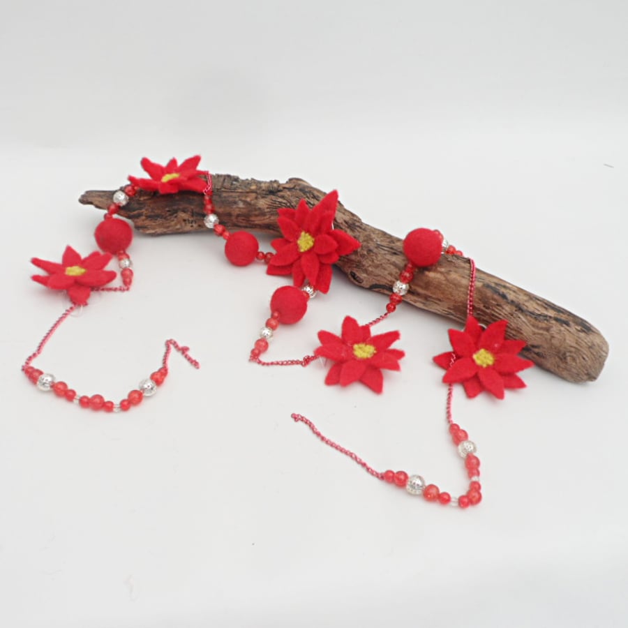 Red felted ball, bead and poinsettia Christmas garland