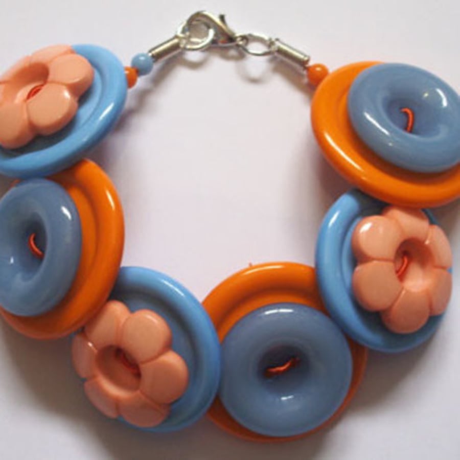 SALE-Chunky orange and blue button bracelet
