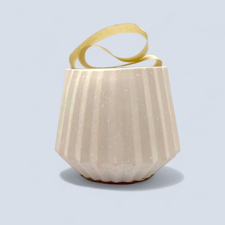 White Heavy Oval Ribbed Door Stop With A Gold Ribbon Handle