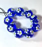 Handmade blue and white daisy patterned lamp work glass beads - Image 2