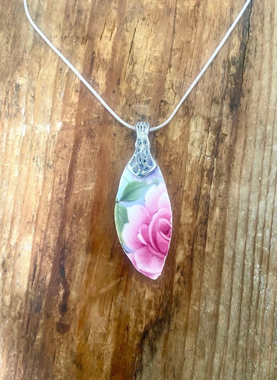 Pink rose vintage crockery pendent on sterling silver chain.