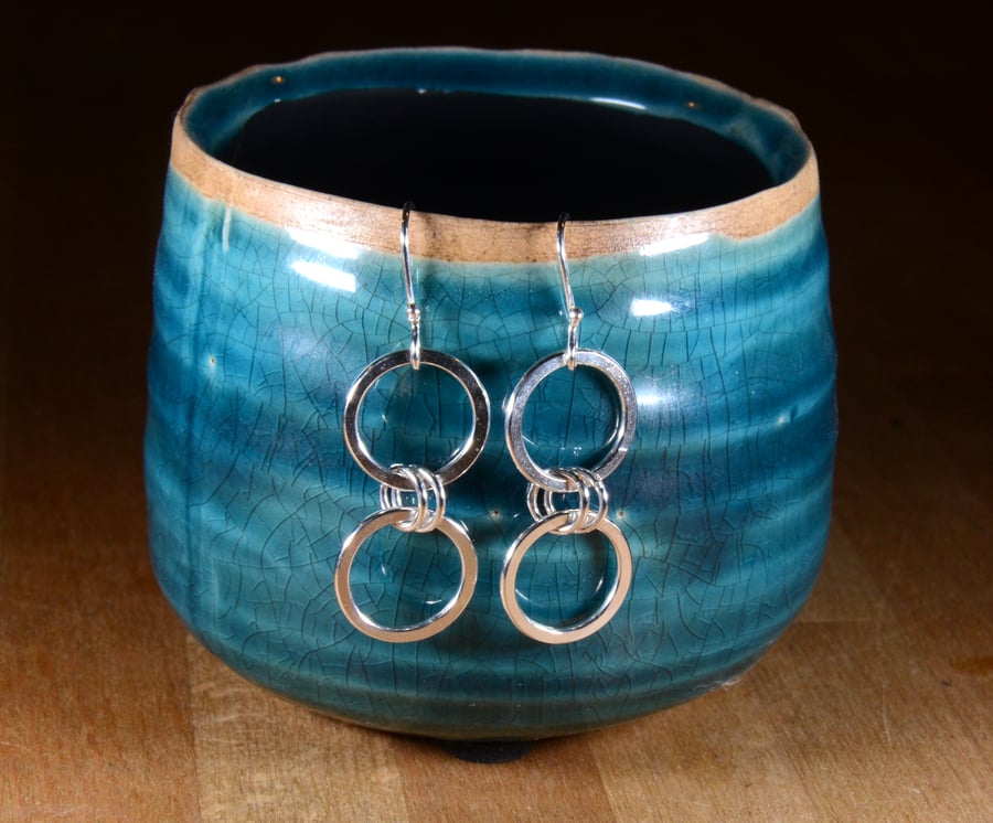 Sterling silver joined hoop earrings 