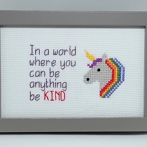 Framed unicorn picture in cross stitch