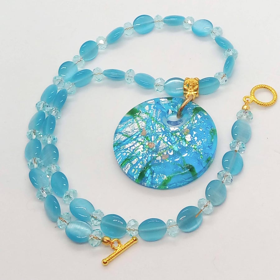Bright Blue Glass Pendant On A Blue Glass Bead and Crystal Necklace