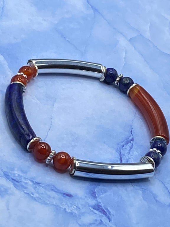Stretchy bracelet with curved silver plated, red agate and lapis lazuli tubes