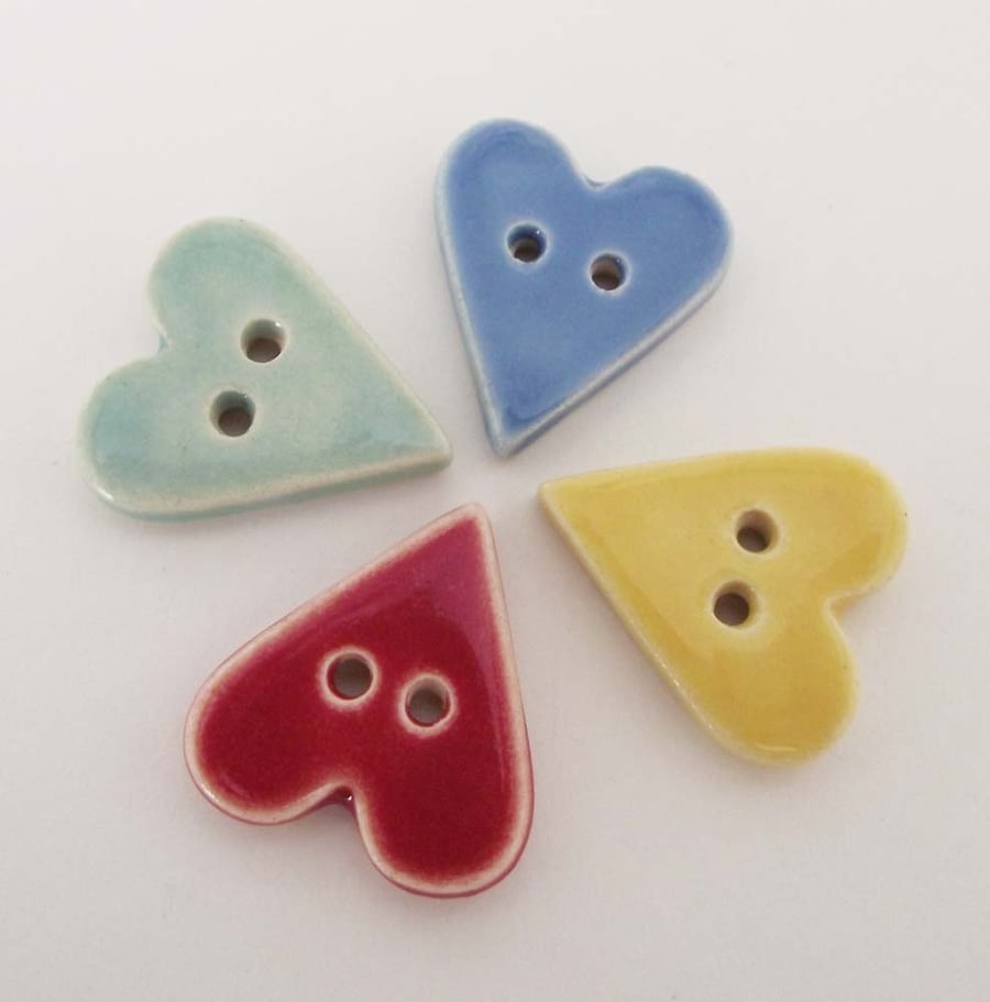 set of four bright heart ceramic buttons 