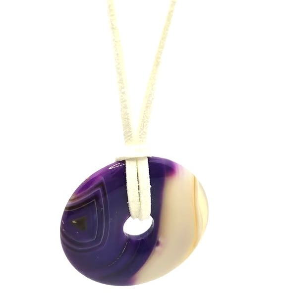Purple dyed agate donut pendant with faux white leather cord