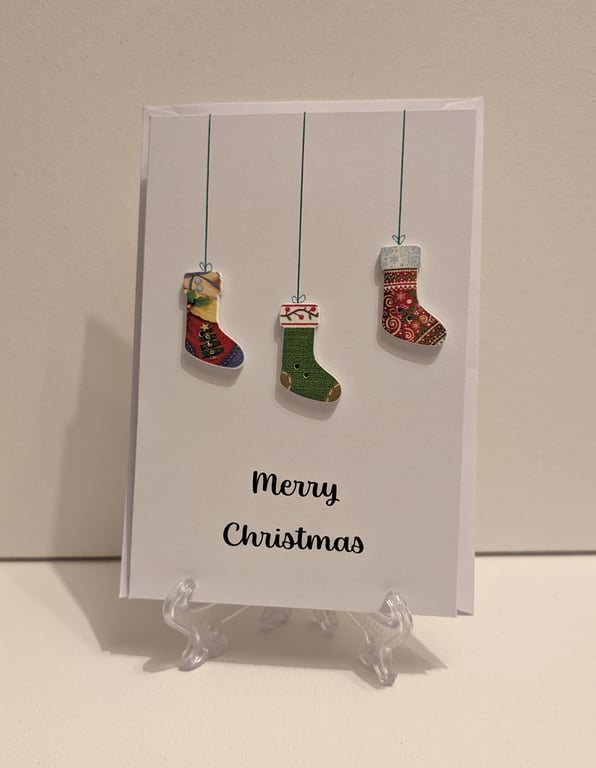 Merry Christmas card with Christmas stocking buttons
