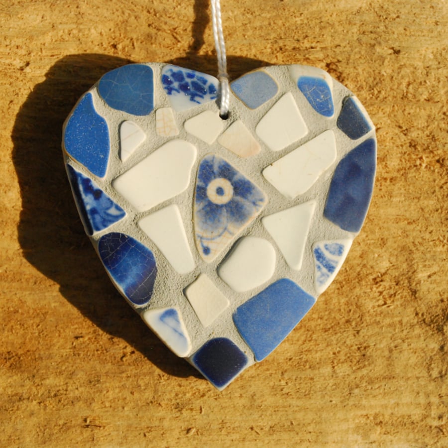 Beach pottery heart mosaic with flower