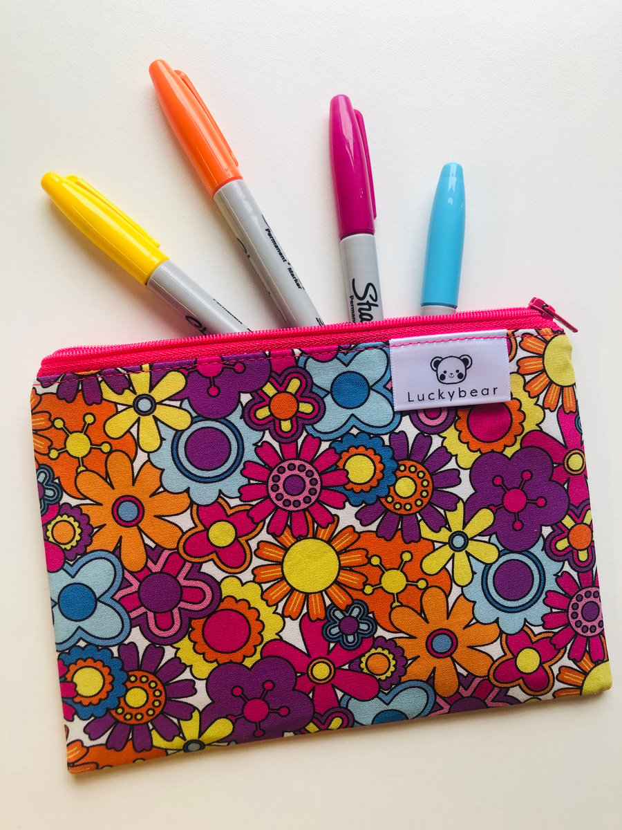 Bold retro floral print in bright colours, zip pouch in bold florals (small)