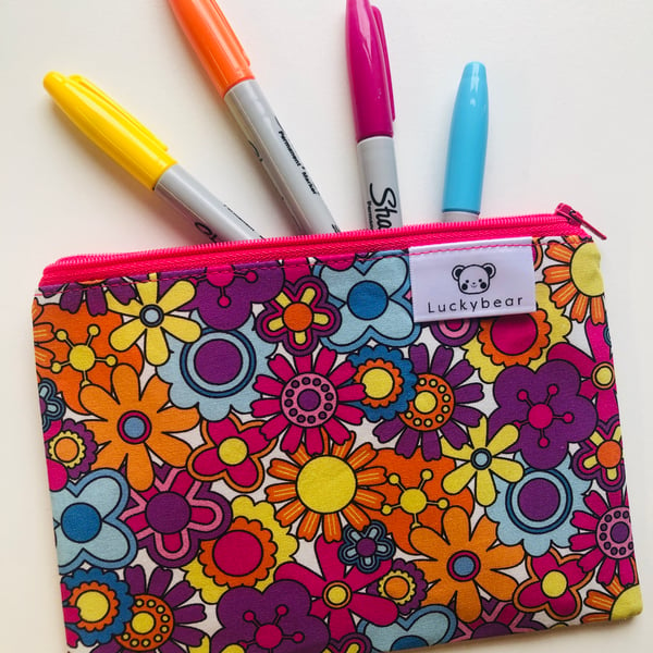 Bold retro floral print in bright colours, zip pouch in bold florals (small)
