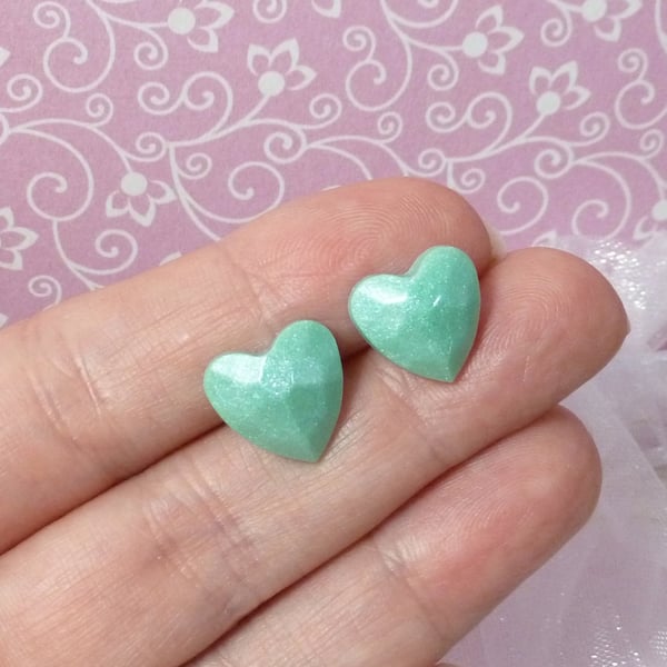 Turquoise shimmering heart studs. Pastel resin heart-shaped earrings for women