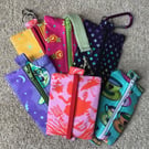 Pouch with Zip. Pencil case has elastic, which means it can be attached to noteb