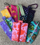 Pouch with Zip. Pencil case has elastic, which means it can be attached to noteb