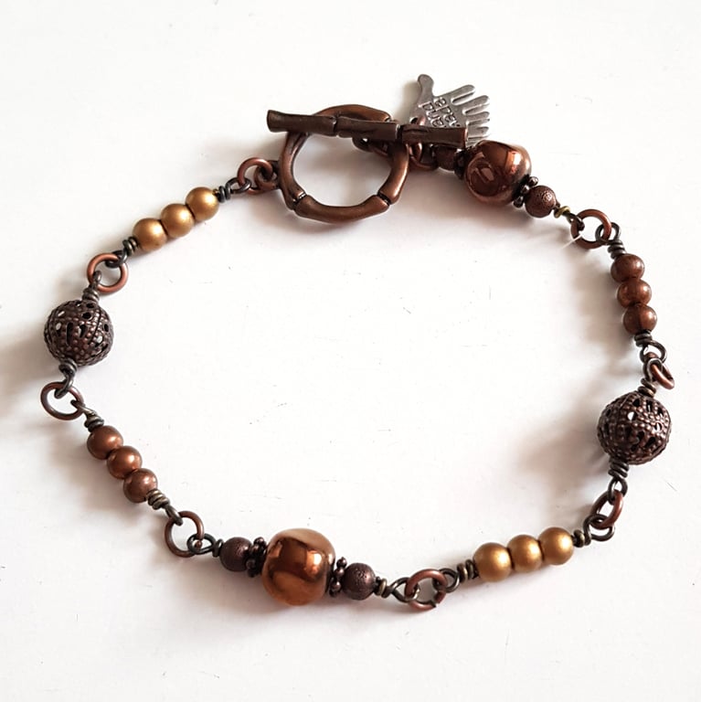 Copper Tone Beaded Bracelet with Decorative T Bar Clasp