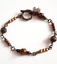 Copper Tone Beaded Bracelet with Decorative T Bar Clasp