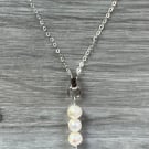 Sterling silver & freshwater pearl trilogy pendant with 16” trace chan