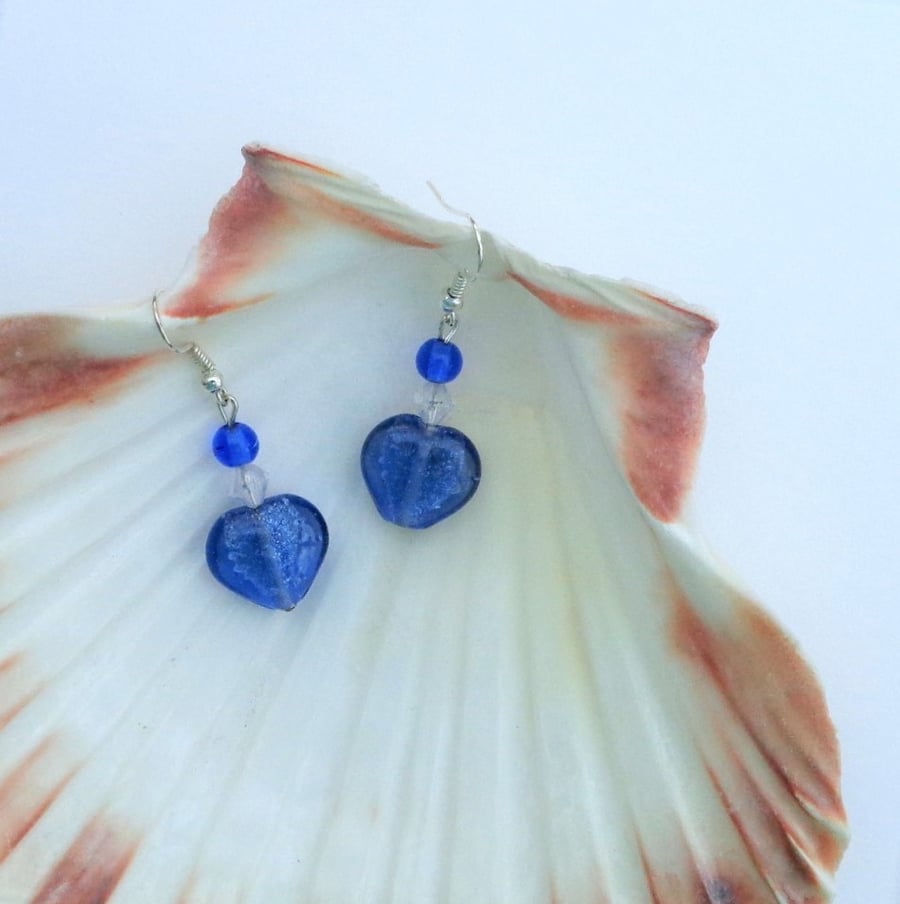 Silver plated drop earrings with deep blue foiled glass hearts 