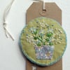 Embroidered linen brooch