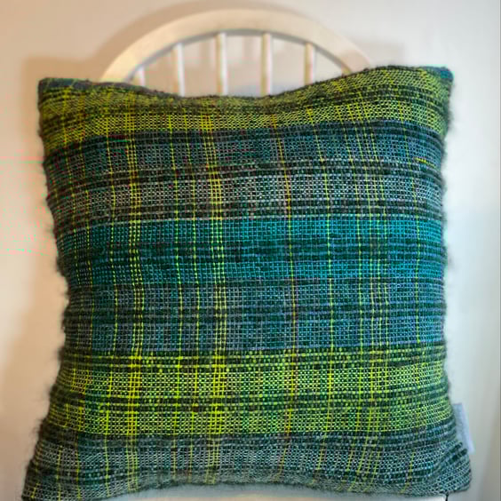   Hand woven cushion in textured mohair and wool ,designed by Yvonne Skelton