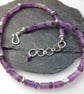 Sterling silver and amethyst bead necklace.