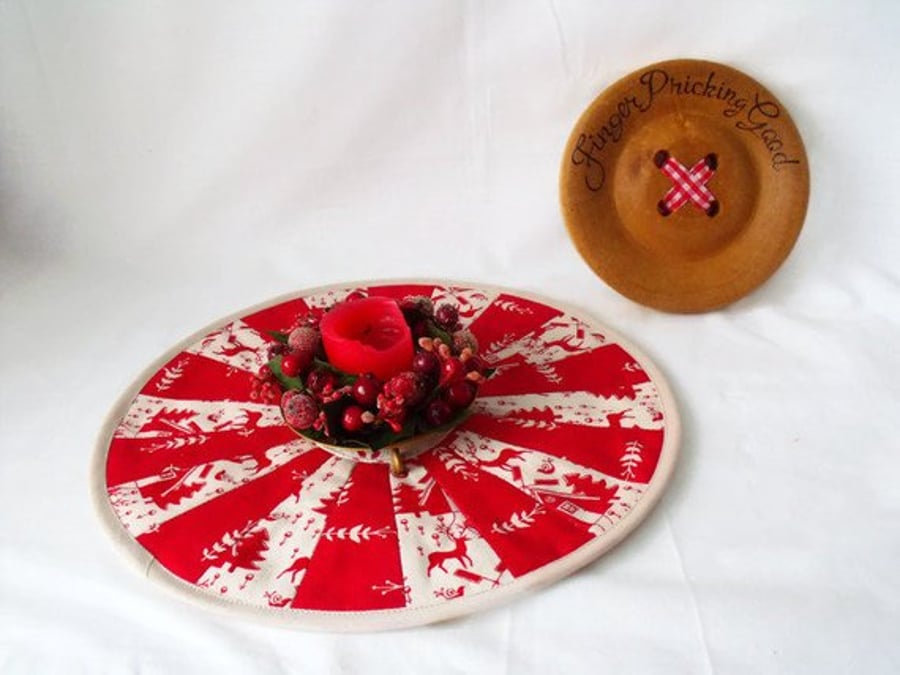 red scandi style patchwork christmas doily, quilted candle mat table decoration