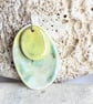 Sterling sllver and ceramic organic necklace, painted by hand with green glazes