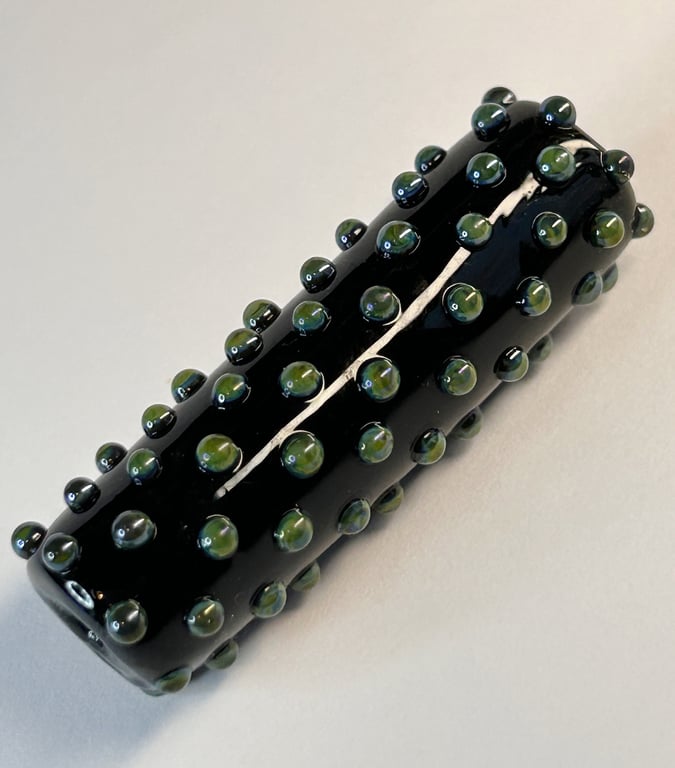 Handmade black and green iridescent lamp work glass focal bead