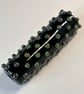 Handmade black and green iridescent lamp work glass focal bead